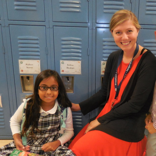 Teacher with young child